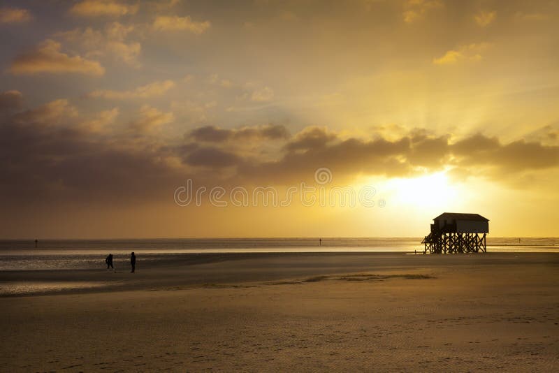 Sunset at the beach of St. Peter-Ording