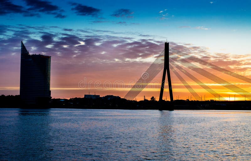 Sunset bridge river Daugava Riga