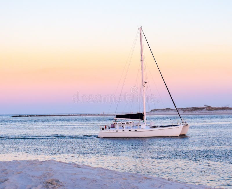 Sunset Charter Sail At Ponce Inlet Jetty With New Smyrna Beach In The Background Stock Image Image Of Ponce Background 188095819