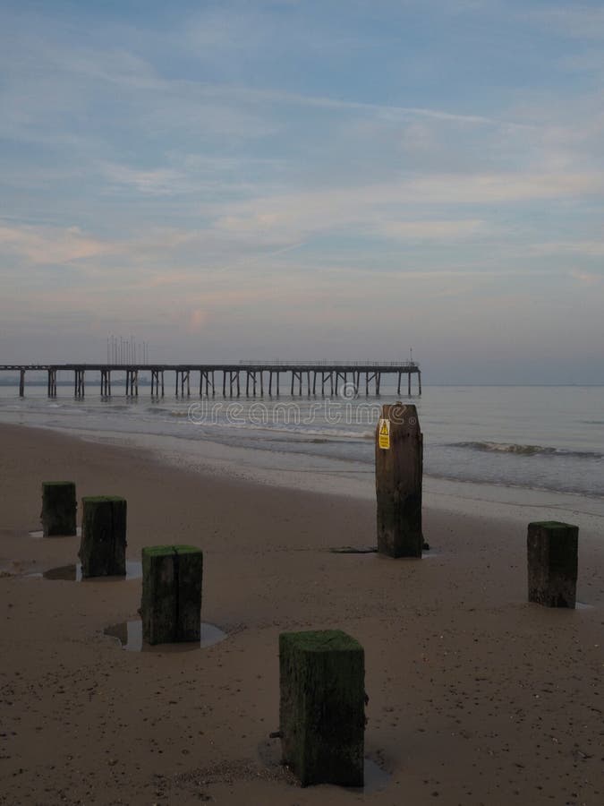 Sunset at Claremont Pier and Ruined Jetty Lowestoft Stock Photo Image