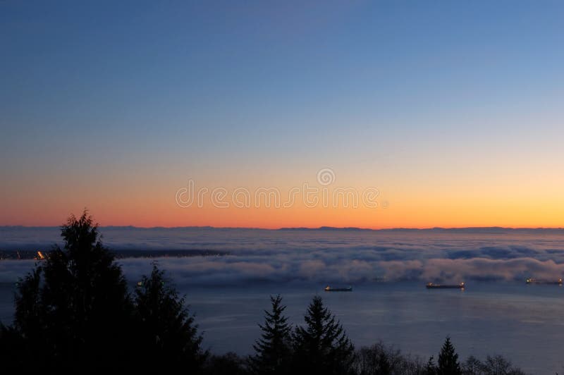 Sunset, clouds over ocean royalty free stock photos