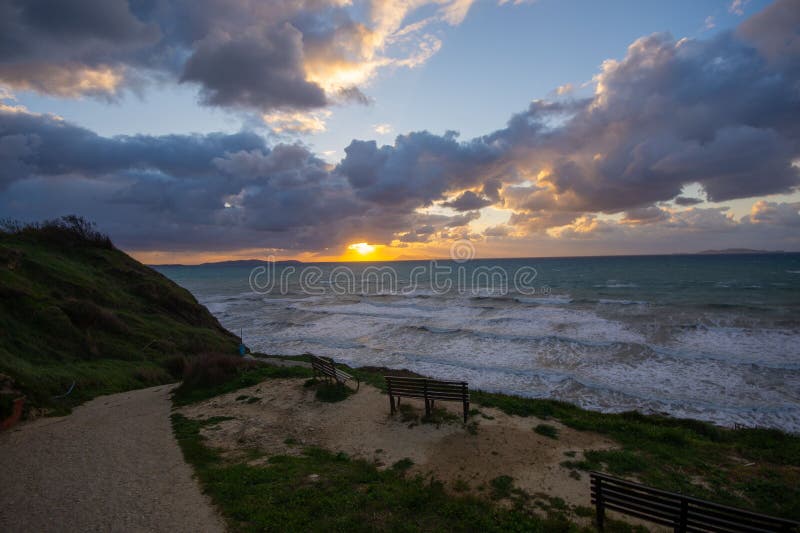 Sunset coastal view with dramatic clouds. stock image
