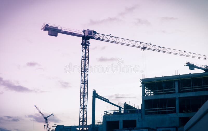 Crane builds a house or overpass within the third ring. royalty free stock images