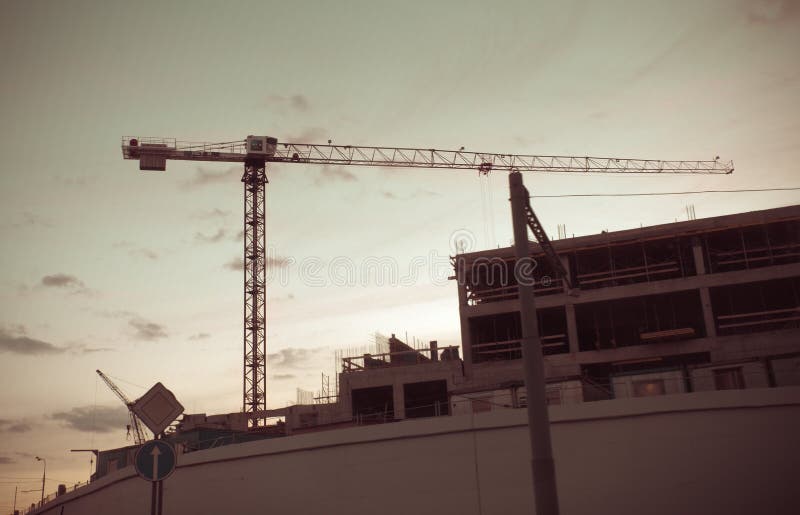 Crane builds a house or overpass within the third ring. stock photography