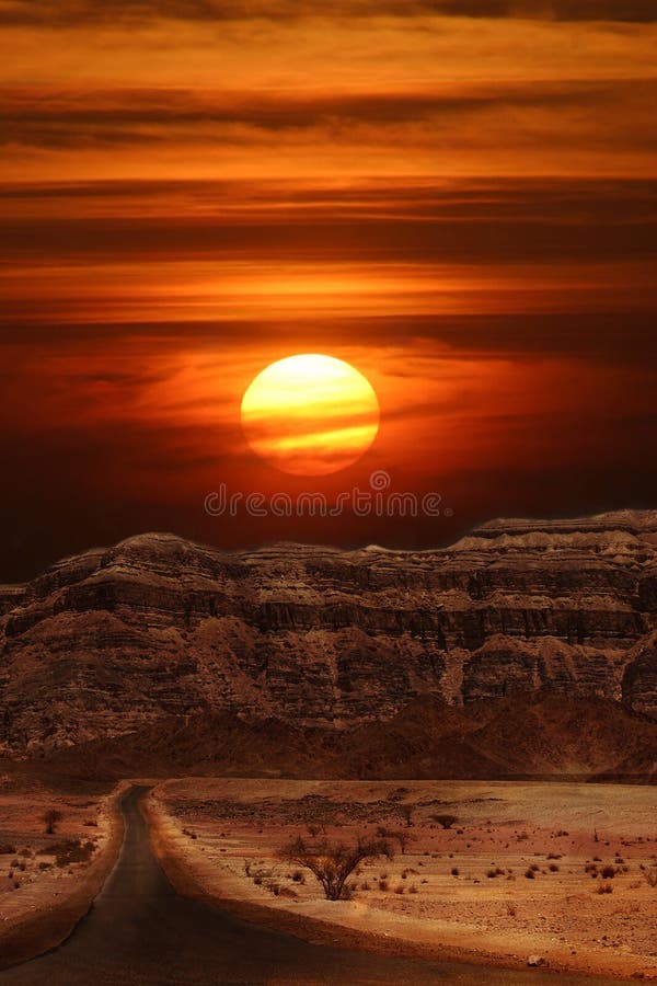 Vertical oriented image of sunset over the mountains of Arava desert in Israel. Vertical oriented image of sunset over the mountains of Arava desert in Israel.