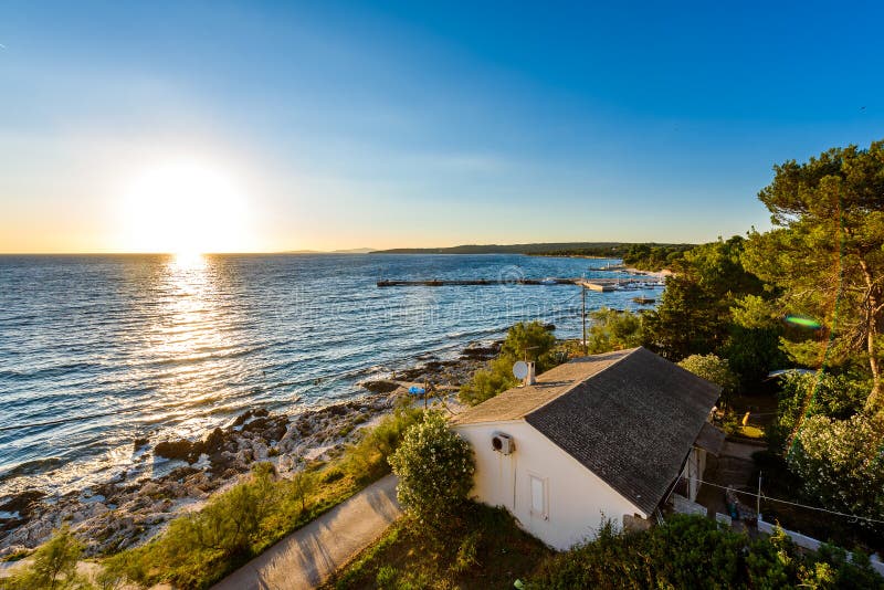 Sunset evening landscape photo of marine port of Silba Croatia.