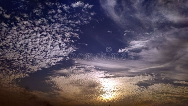 Sunset with fling cloud. Natural Beauty of Sky at afternoon in winter season at the time of sunset with fling cloud royalty free stock photos Sunset with fling cloud. Natural Beauty of Sky at afternoon in winter season at the time of sunset with fling cloud royalty free stock photos