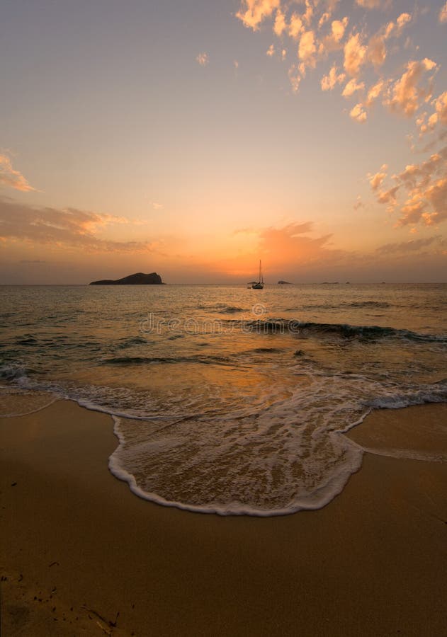 Sunset at beach stock photo. Image of waves, tranquility 3590944