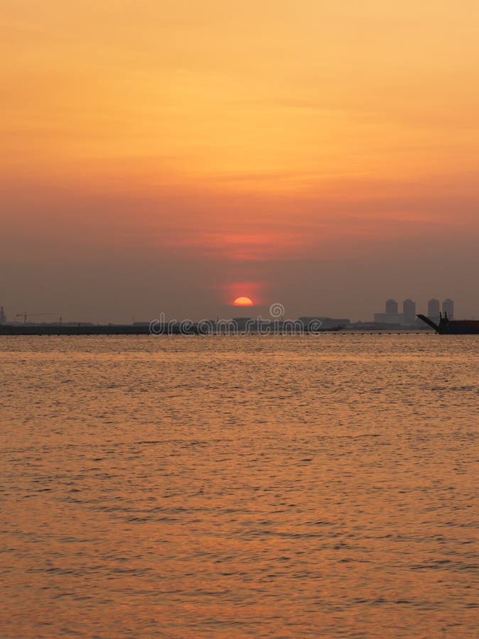 yellow orange sky color on ancol beach. Jakarta, Indonesia stock photos yellow orange sky color on ancol beach. Jakarta, Indonesia stock photos