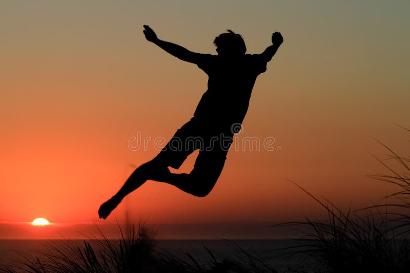 Happy Woman Jumping And Enjoying Life In Field At Sunset In Mountains Stock  Photo, Picture and Royalty Free Image. Image 97035120.