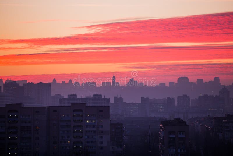 Sunset in Kiev, evening view of the panorama Kiev city. Red clouds in the capital of Ukraine royalty free stock images Sunset in Kiev, evening view of the panorama Kiev city. Red clouds in the capital of Ukraine royalty free stock images