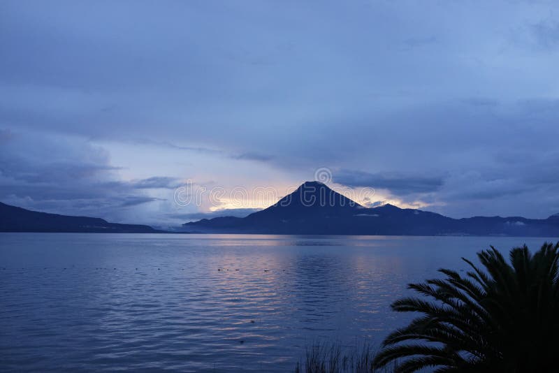 Splendid sunset view in Guatemala on lake Atitlan with volcanoes. Splendid sunset view in Guatemala on lake Atitlan with volcanoes