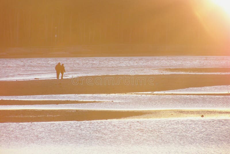 Sunset lovers walking