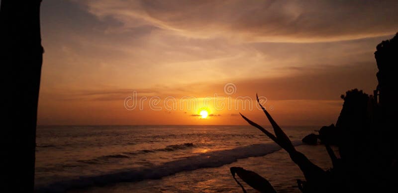 Sunset Ngobaran Beach, Pantai Selatan Stock Photo - Image of pantai