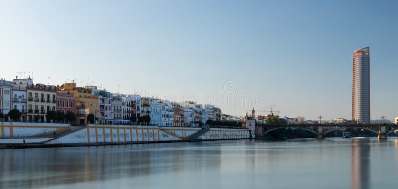 Sunset over the authentic neighborhood of Tirana in Seville with views on Calle Betis, Torre Sevilla