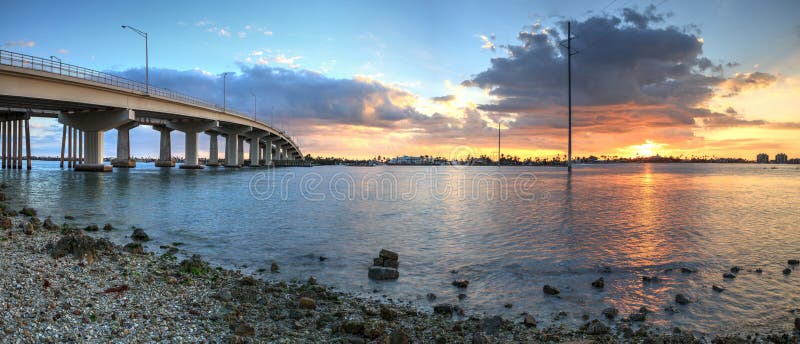 Sunset over the bridge roadway that journeys onto Marco Island