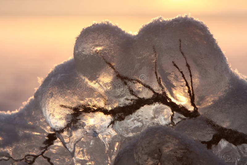 Sunset over frozen lake