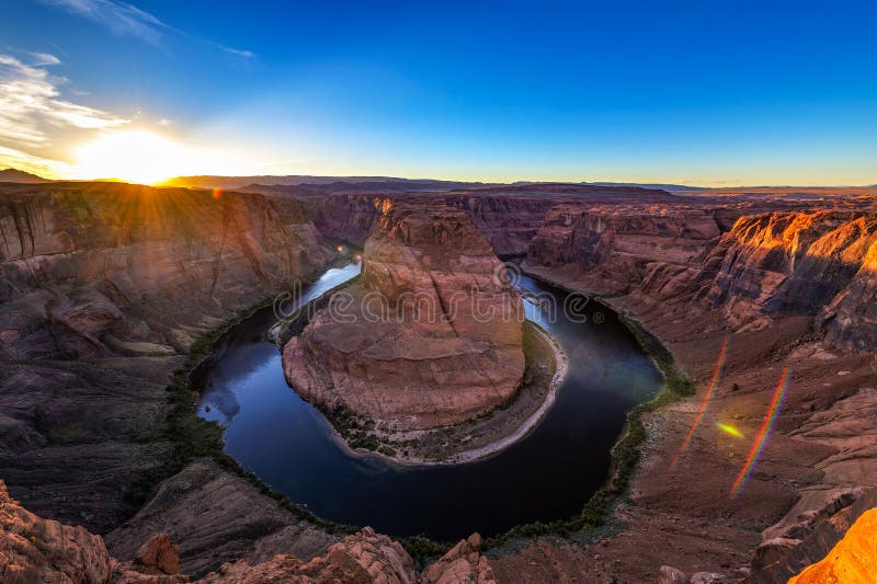 Sunset over Horseshoe Bend and Colorado river royalty free stock image