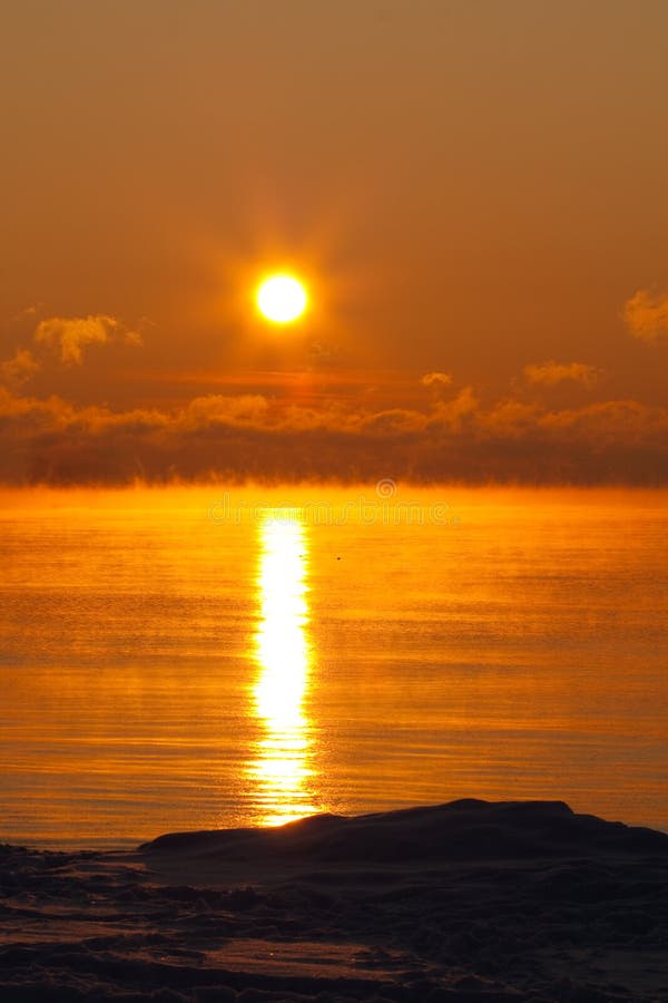 Sunset over icy sea