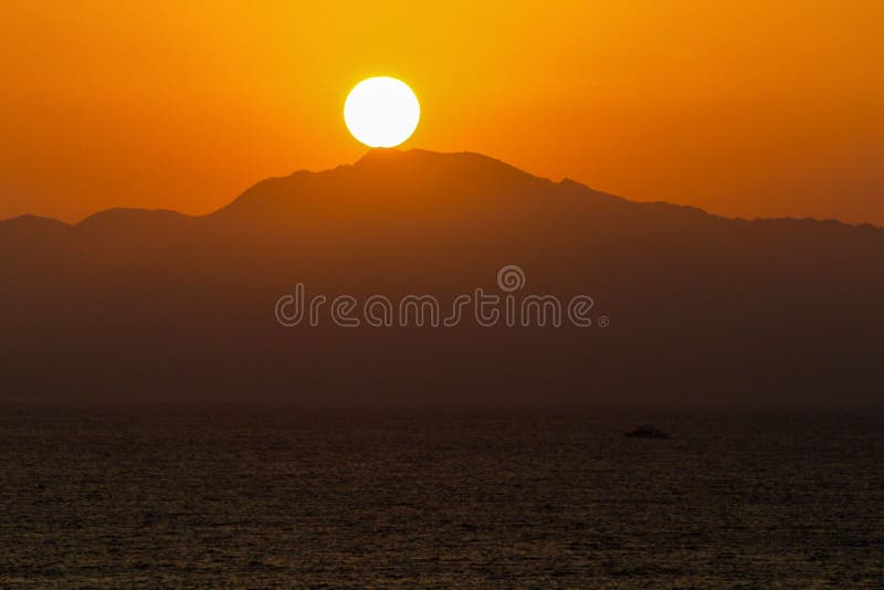 Sunset over an island in the Red Sea stock photos Sunset over an island in the Red Sea stock photos