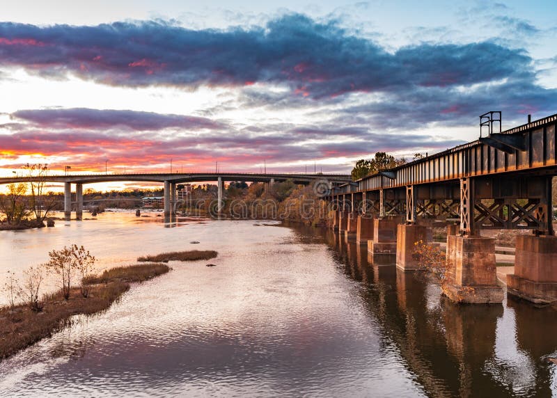 Sunset over James River, Browns Island, Richmond Virginia. Pink clouds over river on a sunset