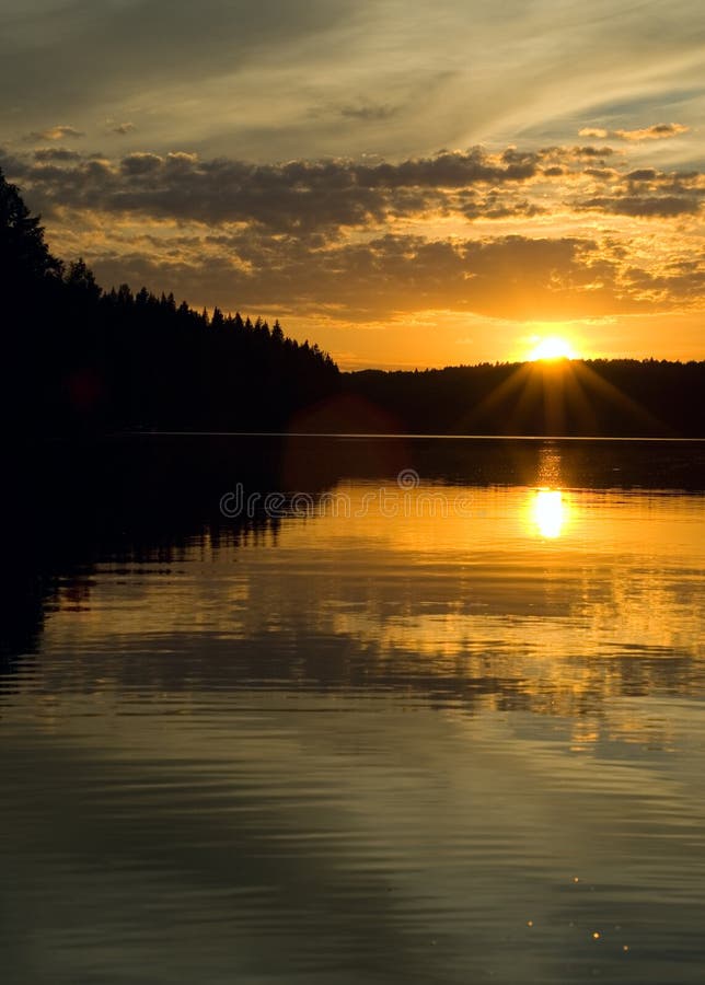 Sunset over the lake royalty free stock photos