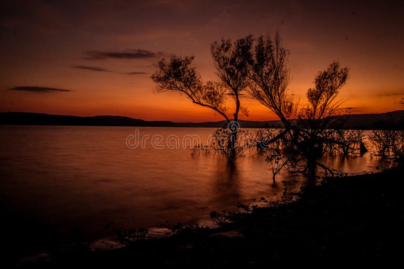 Sunset Over The Lake In Autumn Stock Image Image Of Setting Fiery