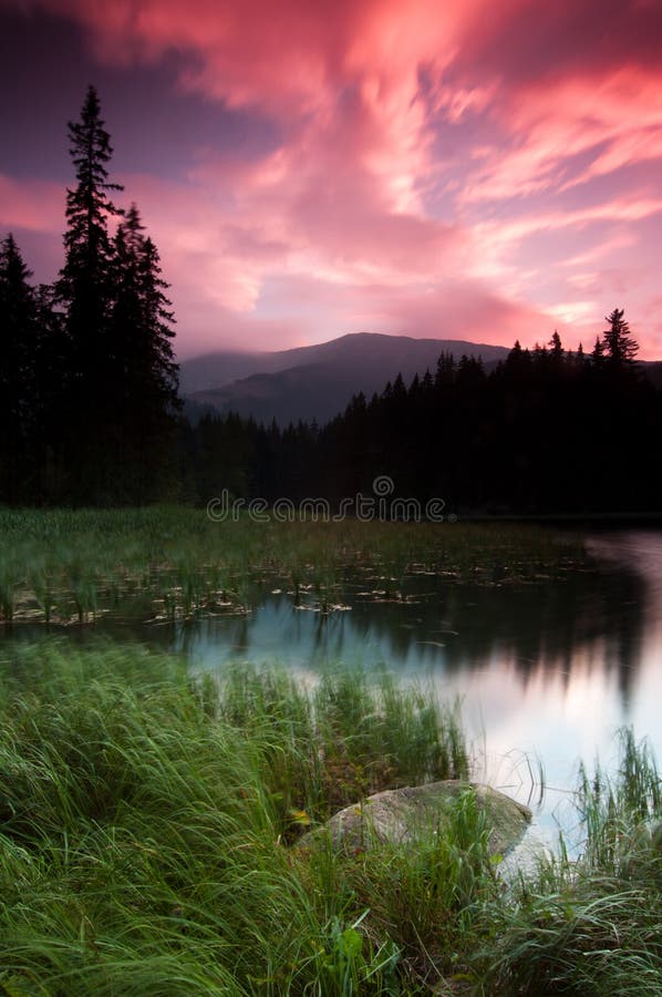 Sunset over mountain lake