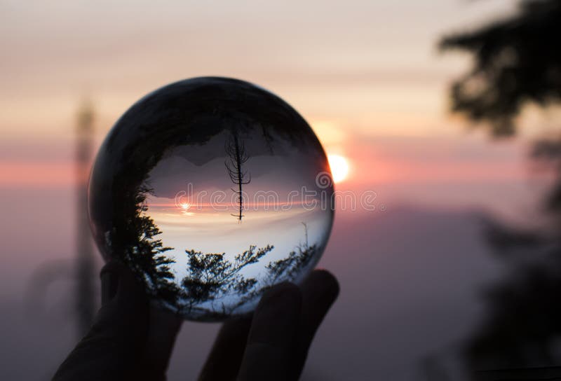 Sunset over Mountain Range with Trees in Silhouette Captured in stock photo Sunset over Mountain Range with Trees in Silhouette Captured in stock photo