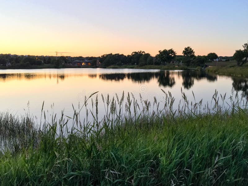 Sunset Over a Quiet Pond in St. John S Newfoundland Stock Photo Image