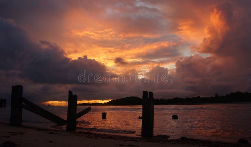 Sunset over Red Island and Arafura Sea Seisia beach Cape York Australia