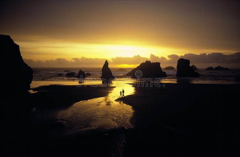 Sunset over rocky beach