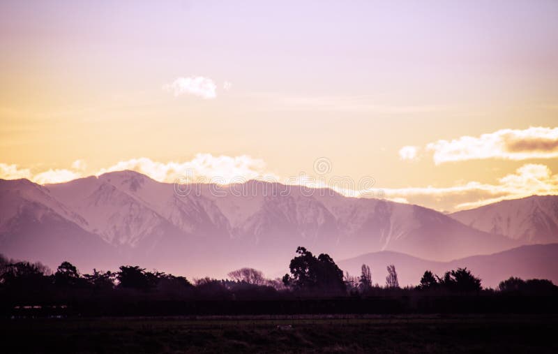 Sunset over the Snow Capped Southern Alps of New Zealand in winter.