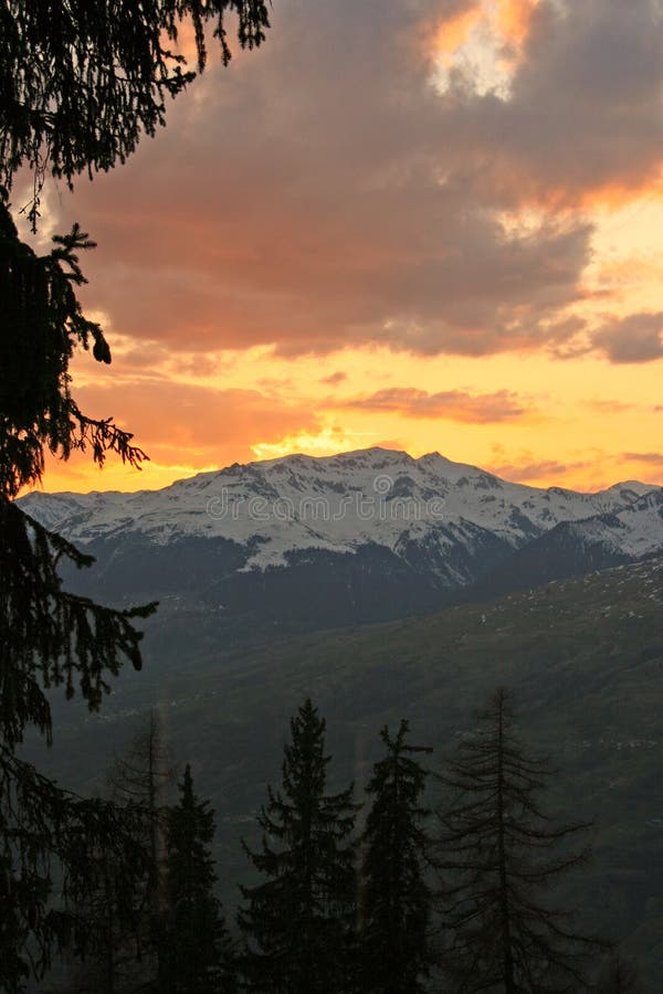 Sunset over a snow covered mountain