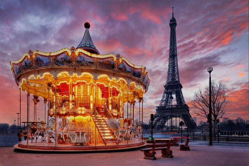 Sunset over vintage carousel close to Eiffel Tower, Paris