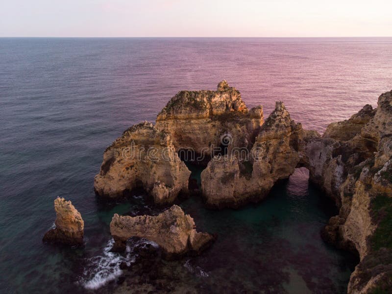 Coastal Golden Cliffs Sunrise Ponta Piedade Lagos Portugal Spectacular Rock  Stock Photo by ©eva.on.the.road 619135628