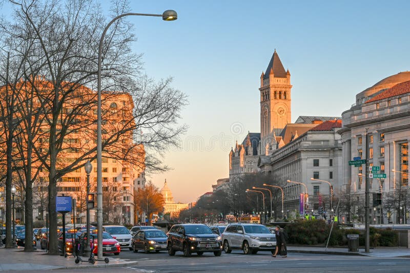 Washington DC, USA - March 27, 2019: Pennsylvania Avenue during sunset in Washington DC. This diagonal street connects the US Capitol and the White House. Washington DC, USA - March 27, 2019: Pennsylvania Avenue during sunset in Washington DC. This diagonal street connects the US Capitol and the White House.