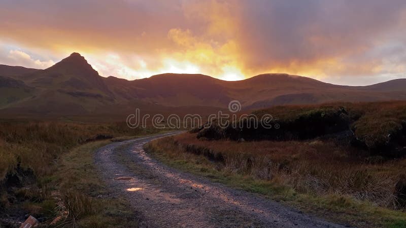 Sunset at the road to Loch Cuithir and Sgurr a Mhadaidh Ruadh - Hill of the Red Fox, Isle of Skye, Scotland