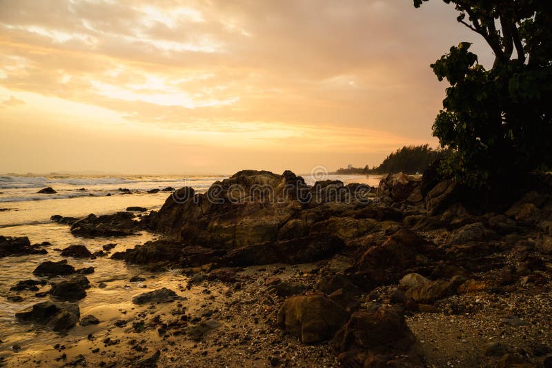 Sunset at the rocky beach stock photos