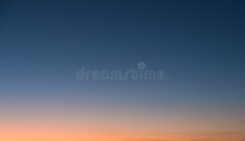 Light blue and orange clear sky during sunset - PatternPictures