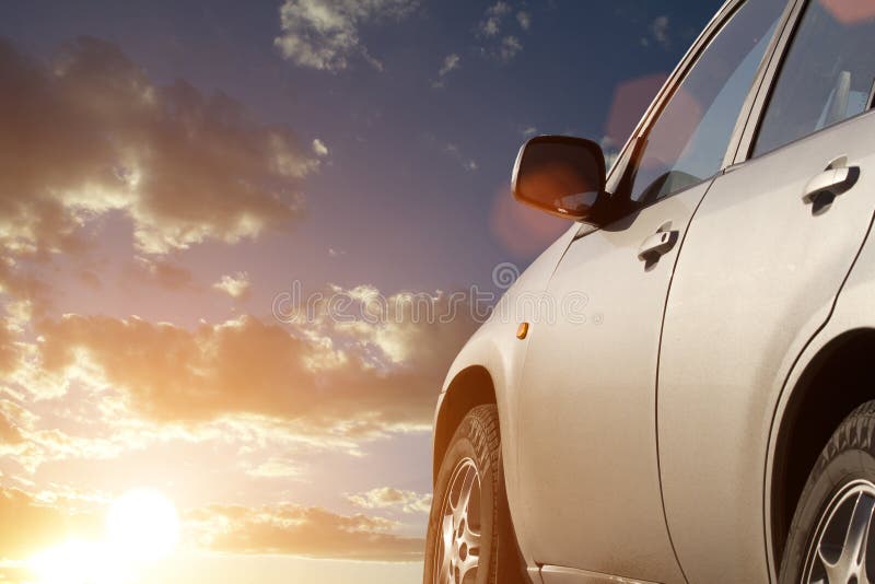 Sunset sky clouds car