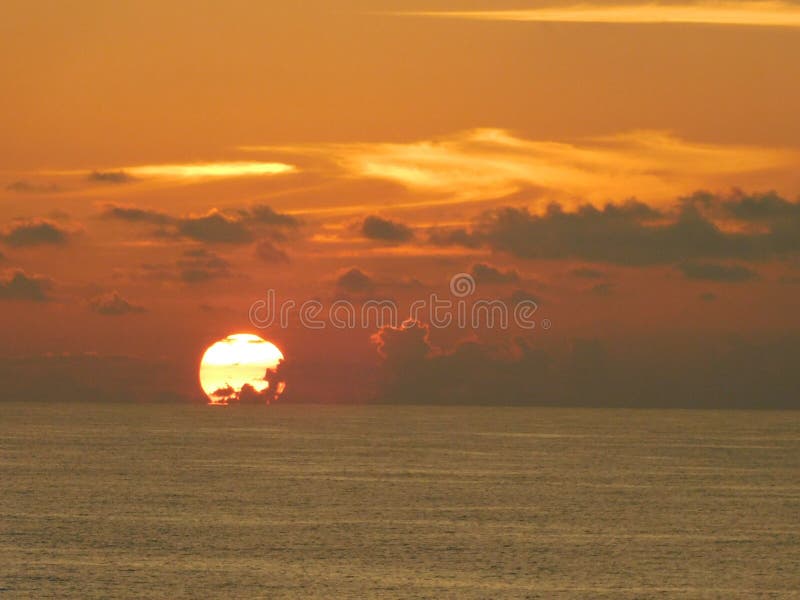 Brilliant Orange And Yellow Sunset On The Caribbean Ocean Stock Image