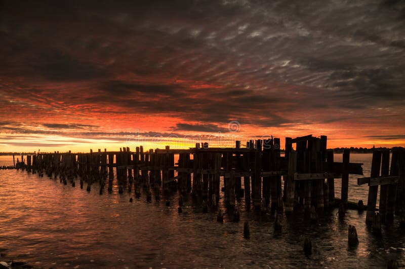 Sunset Sunrise waterfront old pier.