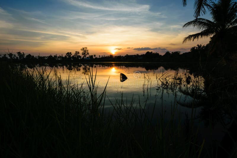 Sunset In The Neighborhood And Reflections In The River Stock Photo,  Picture and Royalty Free Image. Image 96533227.