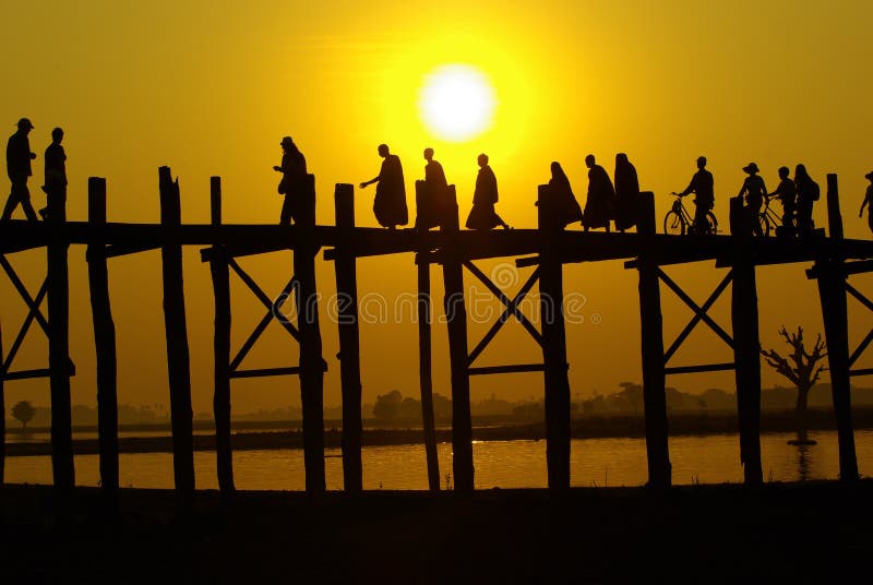 sunset at U-Ben Bridge with myanmar people, Amarapura, Mandalay, Myanmar