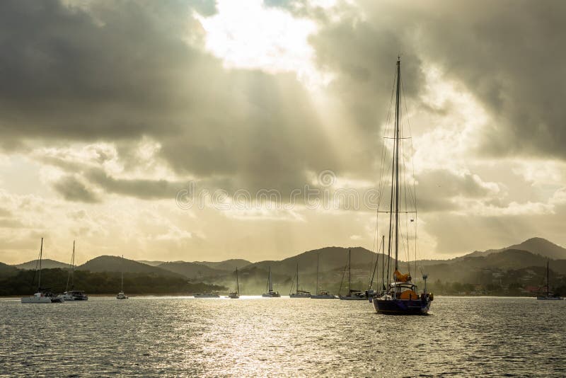 Sunset view of Rodney bay with yachts anchored in the lagoon, Saint Lucia, Caribbean sea stock photo Sunset view of Rodney bay with yachts anchored in the lagoon, Saint Lucia, Caribbean sea stock photo
