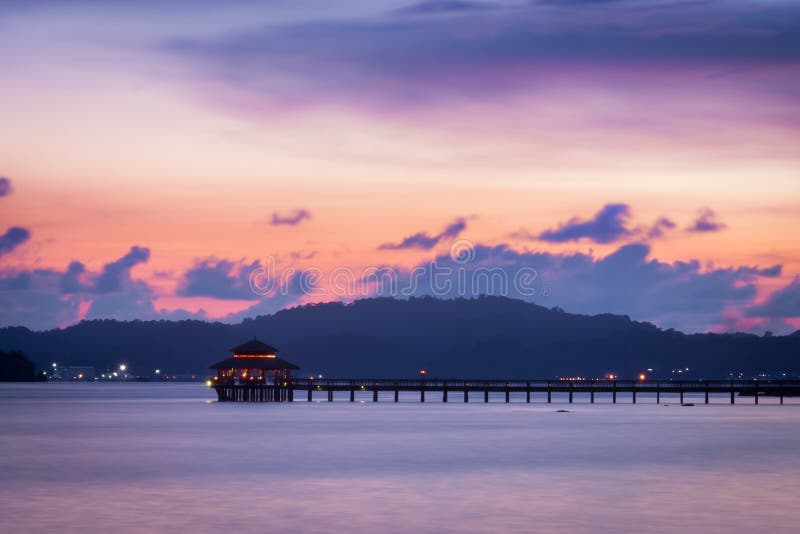 Sunset. It was a private dinner by the beach for a birthday celebration. Took down the beautiful backdrop for a lasting memory stock image Sunset. It was a private dinner by the beach for a birthday celebration. Took down the beautiful backdrop for a lasting memory stock image