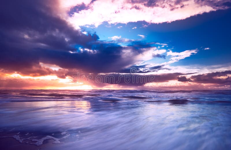 Sunset and waves royalty free stock images