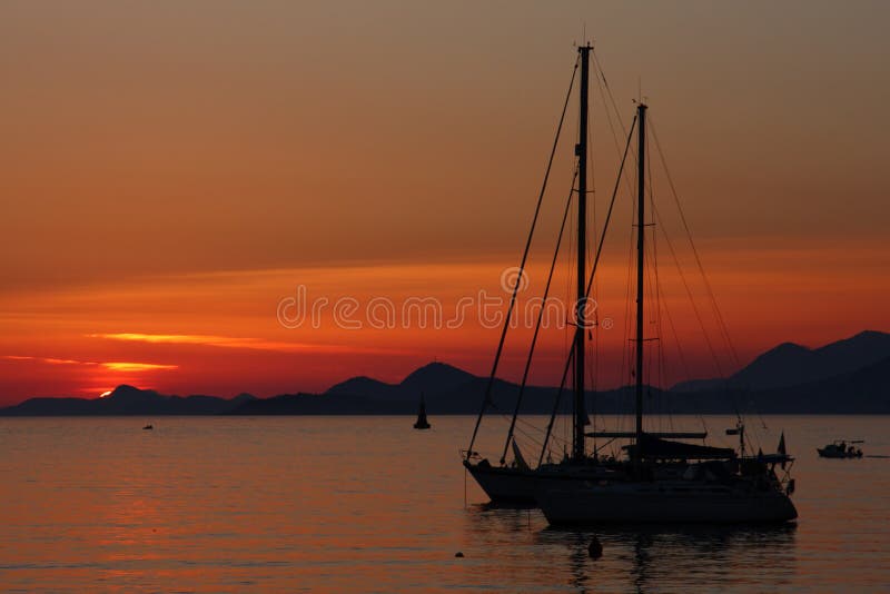 Sunset with yacht silhouette