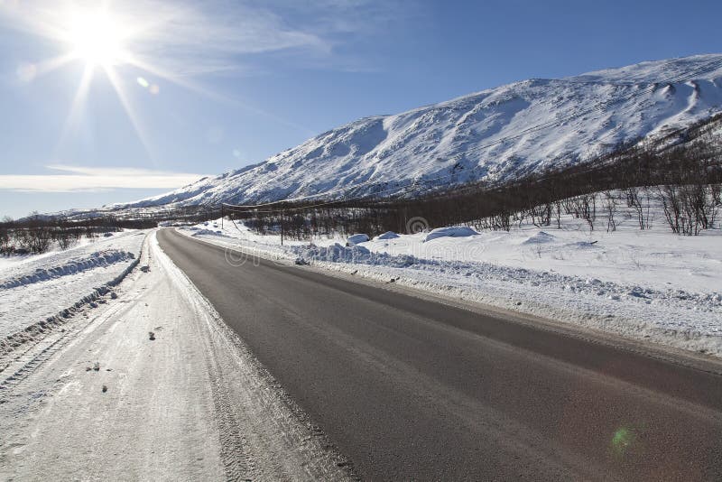 The road to Abisko National park and Narvik in Norway on a sunny day. The road to Abisko National park and Narvik in Norway on a sunny day